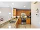 Modern condo kitchen featuring stainless steel appliances at 157 Tampa Ave # 707, Venice, FL 34285