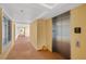 Hallway with elevator and access to condo units at 157 Tampa Ave # 707, Venice, FL 34285