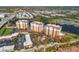 Aerial view of three-story building near waterfront at 157 Tampa Ave # 707, Venice, FL 34285