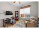 Bright home office features a desk, chair, and large window at 157 Tampa Ave # 707, Venice, FL 34285