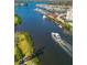 Aerial view of boat on calm waterway near homes at 157 Tampa Ave # 707, Venice, FL 34285