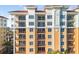 Close-up view of condo building's exterior, highlighting its design at 157 Tampa Ave # 707, Venice, FL 34285