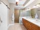 Spa-like bathroom with walk-in shower and double vanity at 157 Tampa Ave # 707, Venice, FL 34285