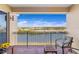 Relaxing balcony overlooking a scenic waterfront view at 157 Tampa Ave # 707, Venice, FL 34285