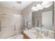 Bathroom with tub/shower combo, vanity, and linen closet at 157 Tampa Ave # 707, Venice, FL 34285
