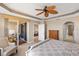 Bright and airy main bedroom with views, access to balcony and sitting area at 157 Tampa Ave # 707, Venice, FL 34285