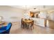 Elegant dining room with a charming table and four chairs at 157 Tampa Ave # 707, Venice, FL 34285
