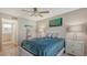 Guest bedroom with twin beds, nightstands, and ample closet space at 7788 Eagle Creek Dr # 7788, Sarasota, FL 34243