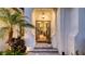 Front doorway and entryway showing double doors with transom and sidelights and a glimpse of the interior at 7928 Matera Ct, Lakewood Ranch, FL 34202