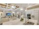 Bright kitchen with island seating and open view to living room, perfect for entertaining guests at 7928 Matera Ct, Lakewood Ranch, FL 34202