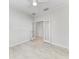 Bedroom with double doors opening to another room at 1269 Backspin Dr, Englewood, FL 34223