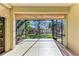 Bright and airy screened lanai, perfect for relaxing and enjoying the outdoors at 1269 Backspin Dr, Englewood, FL 34223