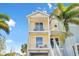 Two-story yellow condo with balcony at 627 Bahia Beach Blvd, Ruskin, FL 33570