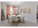 Dining room with round table and modern chairs at 2775 Pecan St, North Port, FL 34287