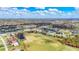 Wide shot of community including green spaces at 54 Medalist Pl, Rotonda West, FL 33947