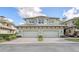 Two-story house with two-car garage and manicured landscaping at 6515 Moorings Point Cir # 201, Lakewood Ranch, FL 34202