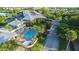 Community features pool, parking and lush landscaping at 611 Destiny Dr # 107, Ruskin, FL 33570