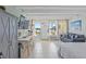 Studio with water views, featuring a workspace and comfortable seating at 611 Destiny Dr # 107, Ruskin, FL 33570