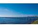 Long wooden pier extending over calm blue water at 611 Destiny Dr # 107, Ruskin, FL 33570