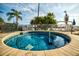Relax in this community hot tub, surrounded by lush tropical landscaping at 611 Destiny Dr # 107, Ruskin, FL 33570