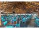 Large tiki bar with plenty of seating at 611 Destiny Dr # 107, Ruskin, FL 33570