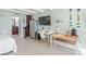 Efficient workspace with a desk, chair, and plenty of natural light at 611 Destiny Dr # 107, Ruskin, FL 33570