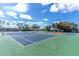 Two tennis courts with pickleball lines at 611 Destiny Dr # 107, Ruskin, FL 33570