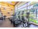 Modern fitness center with cardio equipment and large windows at 611 Destiny Dr # 107, Ruskin, FL 33570