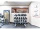 Rack of dumbbells in a well-maintained fitness room at 611 Destiny Dr # 107, Ruskin, FL 33570