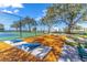 Outdoor cornhole area next to tennis courts at 611 Destiny Dr # 107, Ruskin, FL 33570