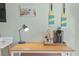 Simple desk with coffee maker, and ample space to work from home at 611 Destiny Dr # 107, Ruskin, FL 33570