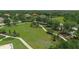 Community park with open green space, walking paths, and a soccer goal at 16806 1St E Ave, Bradenton, FL 34212