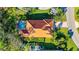Aerial view of home showcasing tile roof and pool at 21 Bayhead Ln, Osprey, FL 34229
