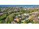 Bird's-eye view of a house and surrounding neighborhood, near the water at 21 Bayhead Ln, Osprey, FL 34229
