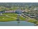 Aerial view of the clubhouse and golf course at 21 Bayhead Ln, Osprey, FL 34229