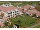 Luxury clubhouse and croquet court viewed from above at 21 Bayhead Ln, Osprey, FL 34229