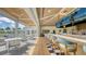 Bar with indoor and outdoor seating areas, overlooking a patio at 21 Bayhead Ln, Osprey, FL 34229