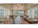 Open dining room with large windows, offering scenic views at 21 Bayhead Ln, Osprey, FL 34229
