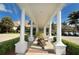 Covered entrance with columns and golf carts at 21 Bayhead Ln, Osprey, FL 34229