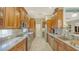 Modern kitchen featuring stainless steel appliances and granite countertops at 21 Bayhead Ln, Osprey, FL 34229