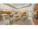 Open living space with comfortable seating and kitchen views at 21 Bayhead Ln, Osprey, FL 34229