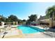 Community pool with plenty of seating and patio at 21 Bayhead Ln, Osprey, FL 34229