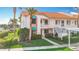 Charming townhome with well-manicured landscaping, a private entrance, and convenient covered parking, near community pool at 4382 Madeira Ct # 3361, Sarasota, FL 34233