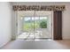 Screened lanai featuring tiled floors and a seating area, providing a relaxing space to enjoy the outdoor views at 4382 Madeira Ct # 3361, Sarasota, FL 34233