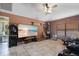 Spacious living room with a large screen TV and eclectic decor at 14308 Tugwell Ave, Port Charlotte, FL 33953