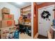 Small home office with desk, shelving, and storage at 14308 Tugwell Ave, Port Charlotte, FL 33953