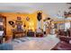 Open living space with eclectic decor and a view into the kitchen at 14308 Tugwell Ave, Port Charlotte, FL 33953