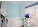 Bathroom with bathtub, single sink, and plenty of storage at 14308 Tugwell Ave, Port Charlotte, FL 33953