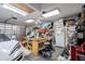 Workshop area in garage with workbench and tools at 14308 Tugwell Ave, Port Charlotte, FL 33953