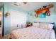 Bedroom with a queen bed and built-in shelving at 14308 Tugwell Ave, Port Charlotte, FL 33953